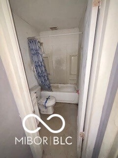 1724-1726 N Somerset Ave, Indianapolis, IN 46222 - bathroom featuring shower / bath combination with curtain and toilet