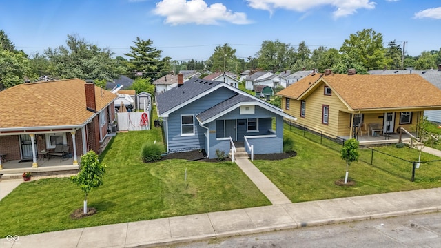 3906 Fletcher Ave, Indianapolis, IN 46203 - view of front of house with a porch and a residential view
