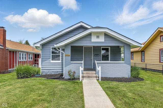 3906 Fletcher Ave, Indianapolis, IN 46203 - shotgun-style home with a porch
