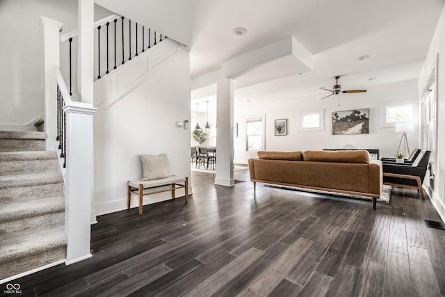 805 N Temple Ave, Indianapolis, IN 46201 - living room featuring ceiling fan, dark wood-style floors, and stairs