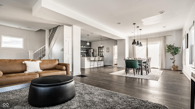 805 N Temple Ave, Indianapolis, IN 46201 - living area featuring dark wood-type flooring, stairs, and recessed lighting