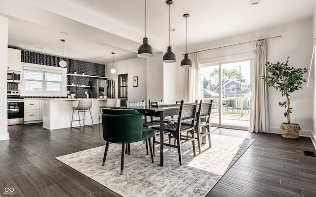 805 N Temple Ave, Indianapolis, IN 46201 - dining area featuring healthy amount of natural light and dark wood-type flooring