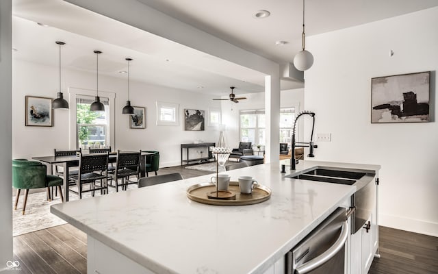 805 N Temple Ave, Indianapolis, IN 46201 - kitchen with stainless steel dishwasher, plenty of natural light, dark wood-style flooring, white cabinetry, and recessed lighting