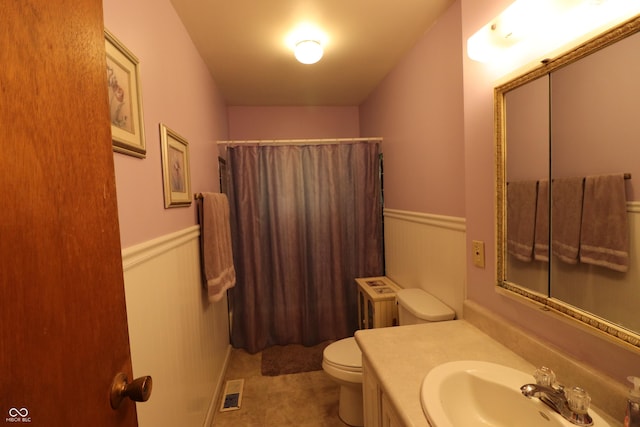 1713 Boca Raton Blvd, Kokomo, IN 46902 - full bath with toilet, a wainscoted wall, vanity, curtained shower, and radiator heating unit