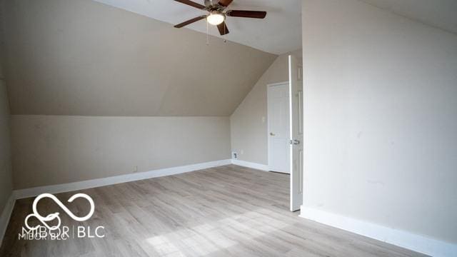 352 W 28th St, Indianapolis, IN 46208 - bonus room with ceiling fan, vaulted ceiling, wood finished floors, and baseboards