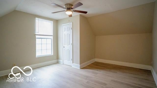 352 W 28th St, Indianapolis, IN 46208 - bonus room with vaulted ceiling, healthy amount of natural light, wood finished floors, a ceiling fan, and baseboards