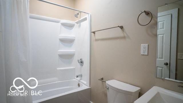 352 W 28th St, Indianapolis, IN 46208 - bathroom with shower / bath combo with shower curtain, toilet, and vanity