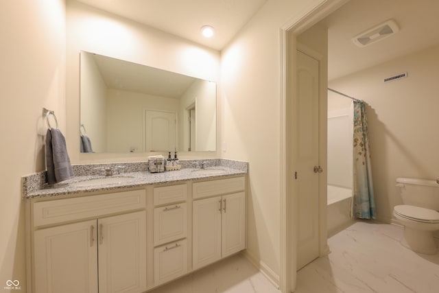 640 Axford Bay Dr, Westfield, IN 46074 - full bath with marble finish floors, double vanity, toilet, and baseboards