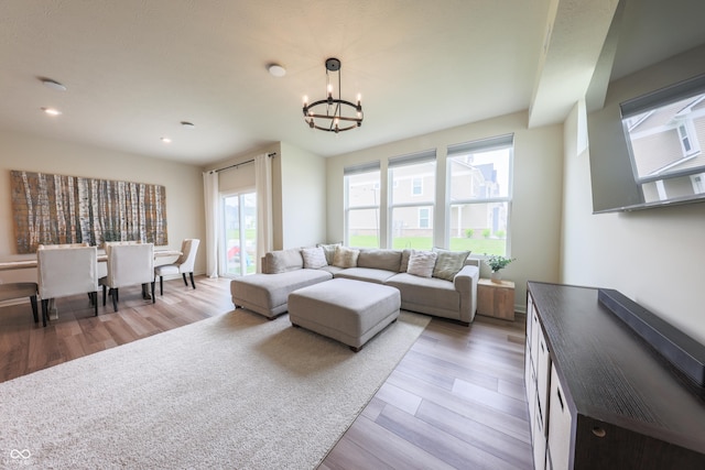 640 Axford Bay Dr, Westfield, IN 46074 - living room with a chandelier, light wood finished floors, and recessed lighting