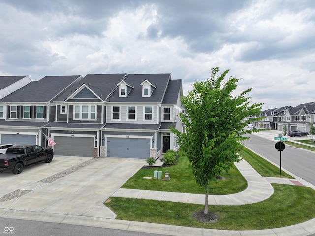 640 Axford Bay Dr, Westfield, IN 46074 - townhome / multi-family property with a garage, driveway, a residential view, and a front yard