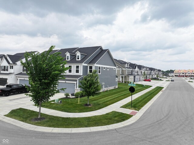 640 Axford Bay Dr, Westfield, IN 46074 - view of asphalt street featuring a residential view, sidewalks, traffic signs, and curbs