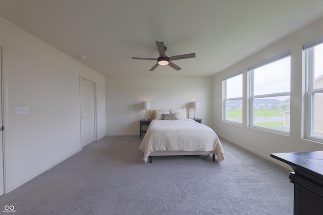 640 Axford Bay Dr, Westfield, IN 46074 - carpeted bedroom featuring multiple windows, baseboards, and a ceiling fan