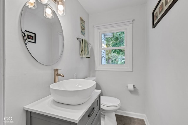 1618 Villa Ave, Indianapolis, IN 46203 - half bathroom featuring vanity, toilet, and baseboards