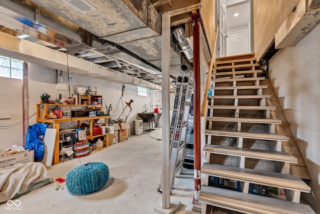 1618 Villa Ave, Indianapolis, IN 46203 - below grade area featuring plenty of natural light, stairs, and a sink