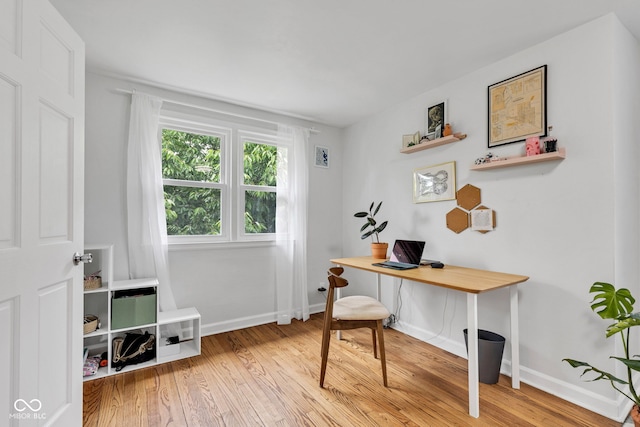 1618 Villa Ave, Indianapolis, IN 46203 - home office with light wood-style floors and baseboards