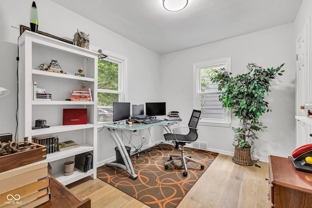 1618 Villa Ave, Indianapolis, IN 46203 - office area featuring wood finished floors, healthy amount of natural light, and baseboards