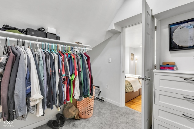 1618 Villa Ave, Indianapolis, IN 46203 - spacious closet featuring light colored carpet and lofted ceiling