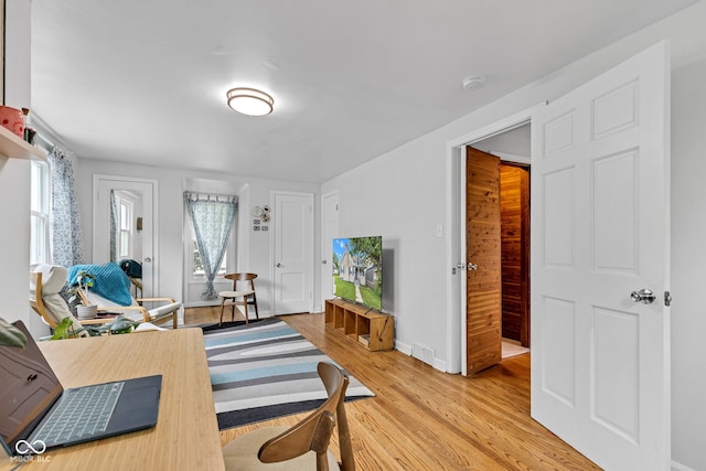 1618 Villa Ave, Indianapolis, IN 46203 - living area featuring light wood-style floors and baseboards