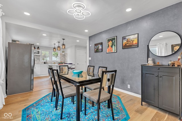 1618 Villa Ave, Indianapolis, IN 46203 - dining area with light wood-style floors and recessed lighting