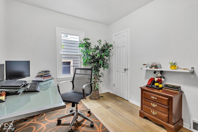 1618 Villa Ave, Indianapolis, IN 46203 - home office with wood finished floors and baseboards