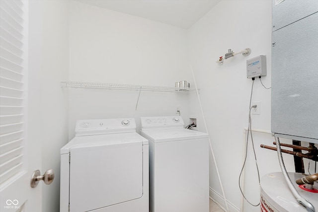 355 E Ohio St Unit 209, Indianapolis, IN 46204 - laundry room featuring washing machine and dryer