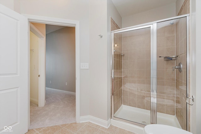355 E Ohio St Unit 209, Indianapolis, IN 46204 - full bath with a shower stall, baseboards, and toilet