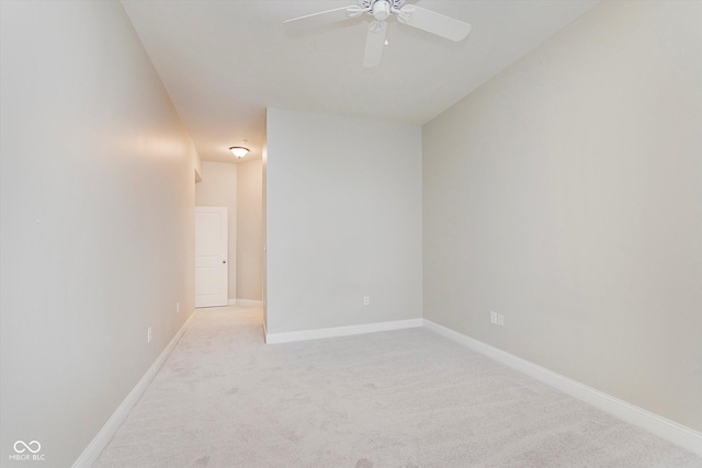 355 E Ohio St Unit 209, Indianapolis, IN 46204 - spare room with light colored carpet, ceiling fan, and baseboards