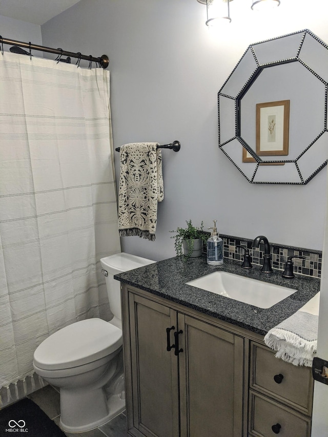 10421 Sand Creek Blvd, Fishers, IN 46037 - full bathroom featuring vanity, toilet, curtained shower, and tile patterned floors