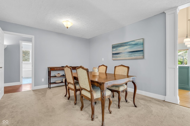 103 Gettysburg, Coatesville, IN 46121 - dining area featuring a textured ceiling and light carpet