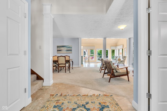 103 Gettysburg, Coatesville, IN 46121 - hall featuring light colored carpet, light tile patterned floors, and stairway