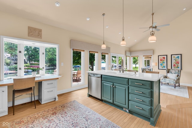 103 Gettysburg, Coatesville, IN 46121 - kitchen with stainless steel dishwasher, light wood-style floors, light countertops, green cabinetry, and recessed lighting