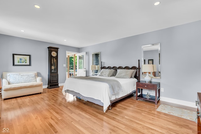 103 Gettysburg, Coatesville, IN 46121 - bedroom with light wood-style flooring, recessed lighting, and access to exterior