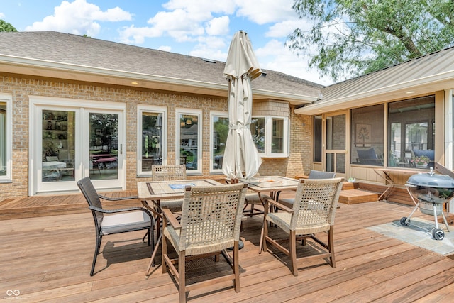103 Gettysburg, Coatesville, IN 46121 - deck featuring outdoor dining space, a sunroom, and area for grilling