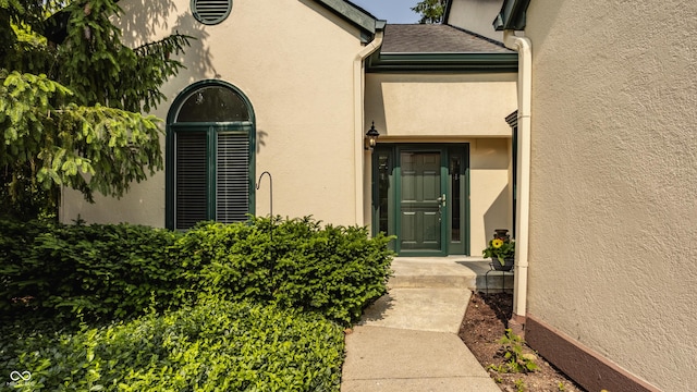 4428 Edinburgh Pt, Indianapolis, IN 46228 - doorway to property featuring stucco siding