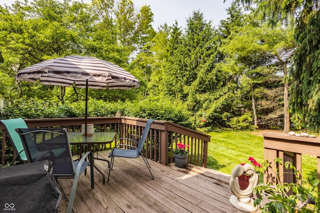 4428 Edinburgh Pt, Indianapolis, IN 46228 - deck with outdoor dining area and a yard