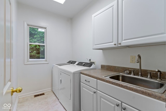 11036 Ravenna Way, Indianapolis, IN 46236 - laundry area with washing machine and dryer, cabinet space, and baseboards