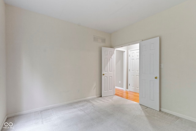 11036 Ravenna Way, Indianapolis, IN 46236 - unfurnished bedroom featuring light colored carpet and baseboards