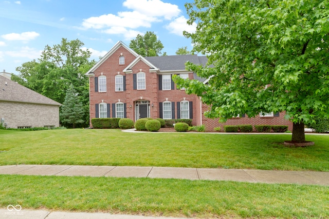 11036 Ravenna Way, Indianapolis, IN 46236 - colonial house featuring brick siding and a front yard