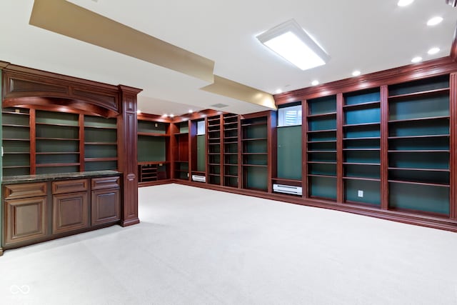 11036 Ravenna Way, Indianapolis, IN 46236 - empty room featuring light carpet, recessed lighting, and built in features