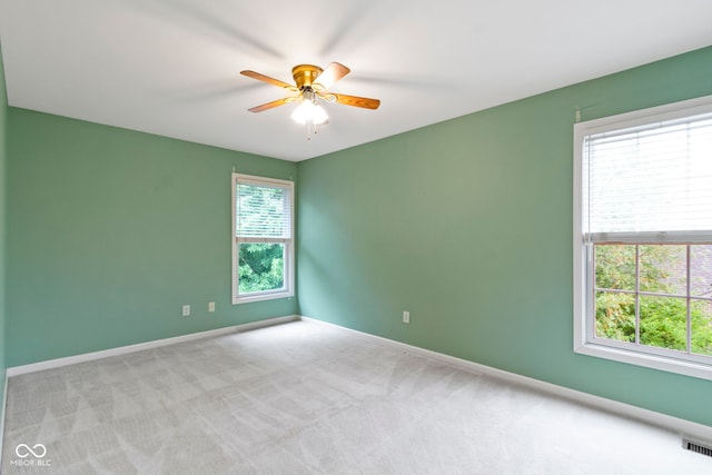 11036 Ravenna Way, Indianapolis, IN 46236 - spare room with a ceiling fan, baseboards, and carpet