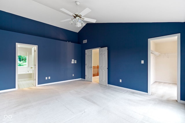 11036 Ravenna Way, Indianapolis, IN 46236 - unfurnished bedroom with a spacious closet, carpet, high vaulted ceiling, a closet, and connected bathroom