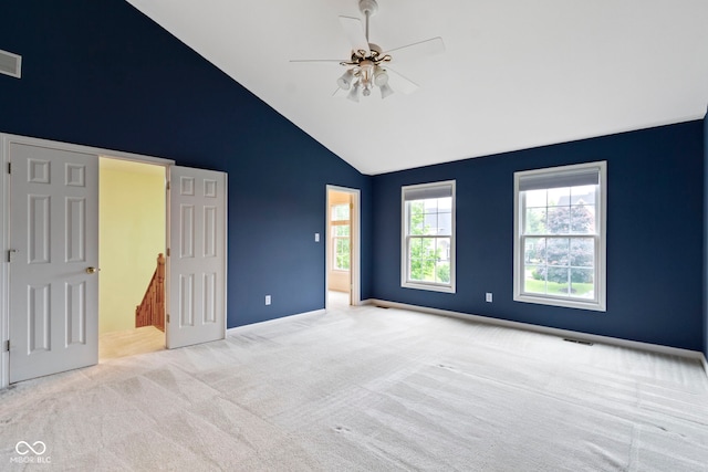11036 Ravenna Way, Indianapolis, IN 46236 - unfurnished bedroom featuring carpet, high vaulted ceiling, baseboards, connected bathroom, and ceiling fan