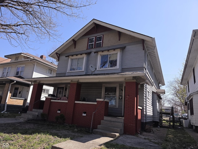 2913 Boulevard Pl, Indianapolis, IN 46208 - view of front of house with a porch and brick siding