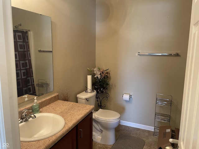 2253 Jaybird Dr, Greenfield, IN 46140 - bathroom featuring toilet, vanity, and baseboards