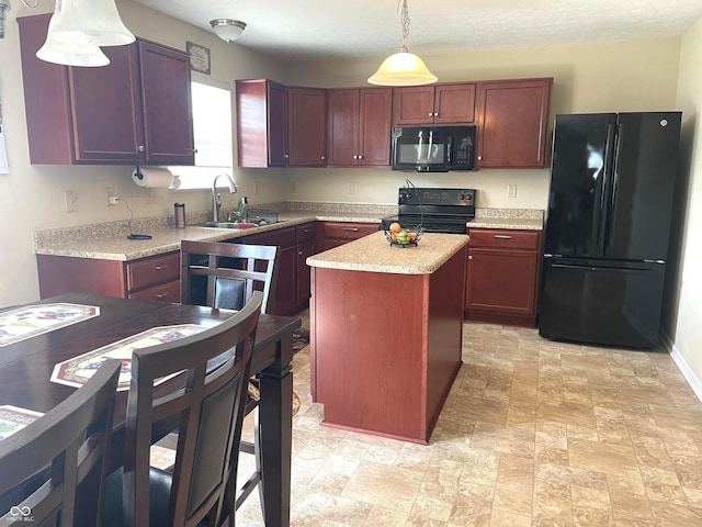 2253 Jaybird Dr, Greenfield, IN 46140 - kitchen featuring black appliances, light countertops, hanging light fixtures, a center island, and stone finish flooring