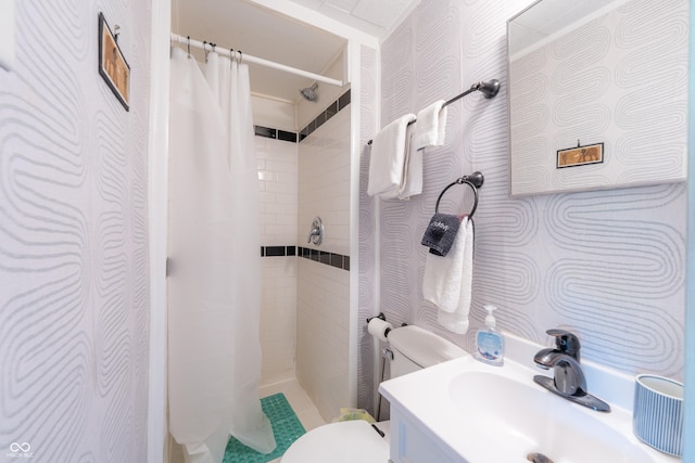 1101 S Rogers St, Bloomington, IN 47403 - full bath with toilet, wallpapered walls, a shower stall, and vanity