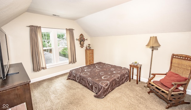 5024 N Kenwood Ave, Indianapolis, IN 46208 - bedroom featuring carpet floors, lofted ceiling, and baseboards