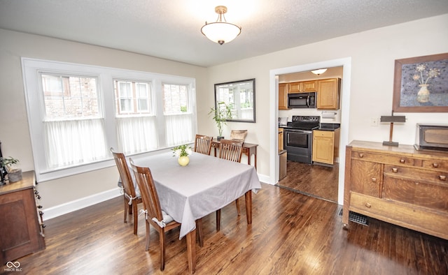 5024 N Kenwood Ave, Indianapolis, IN 46208 - dining area featuring dark wood-style floors and baseboards