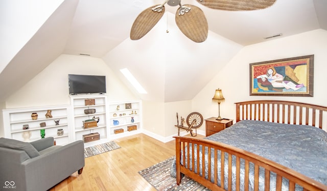 5024 N Kenwood Ave, Indianapolis, IN 46208 - bedroom featuring wood finished floors, vaulted ceiling, a ceiling fan, and baseboards