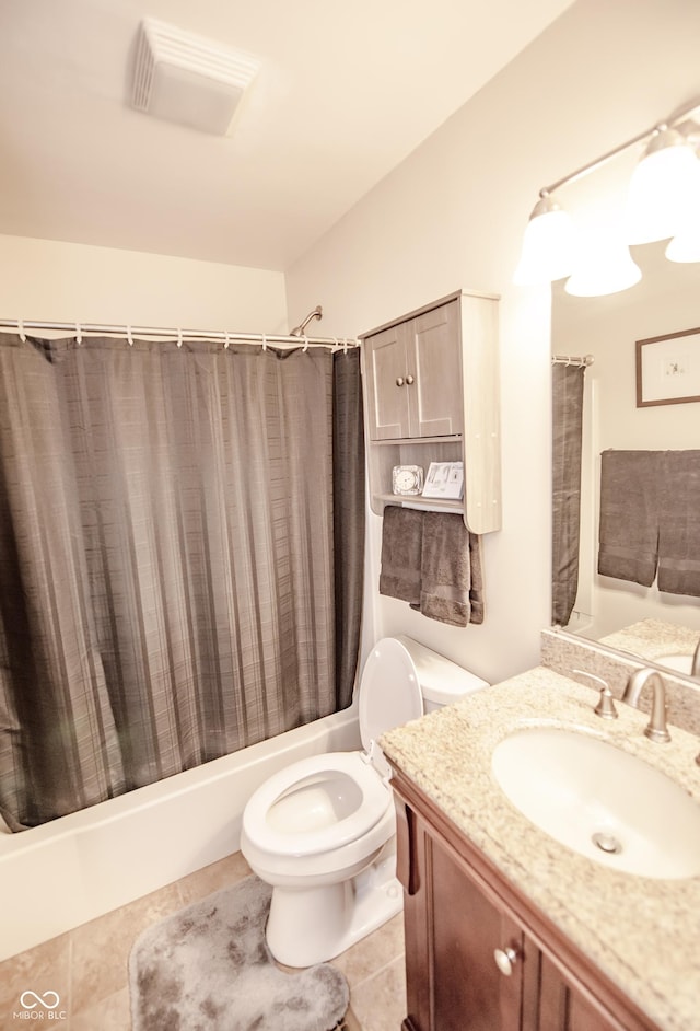 5024 N Kenwood Ave, Indianapolis, IN 46208 - bathroom featuring vanity, shower / bath combination with curtain, toilet, and tile patterned floors
